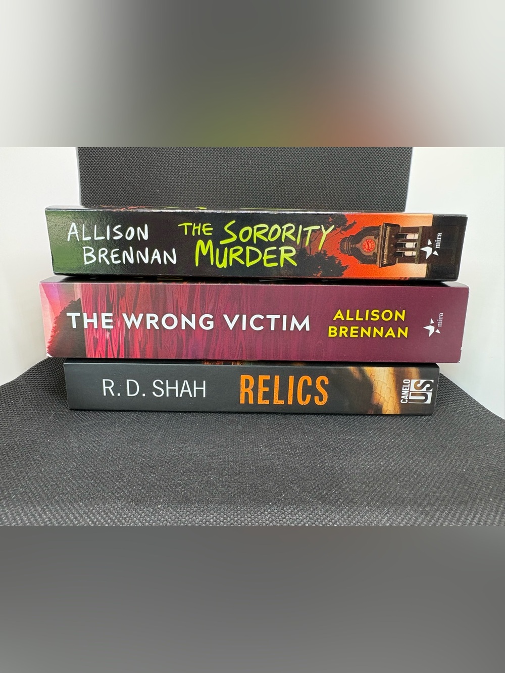 Stack of Three Paperback Mystery, suspense books